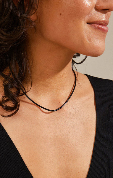 PILGRIM CHARM LEATHER CORD NECKLACE IN BLACK SILVER