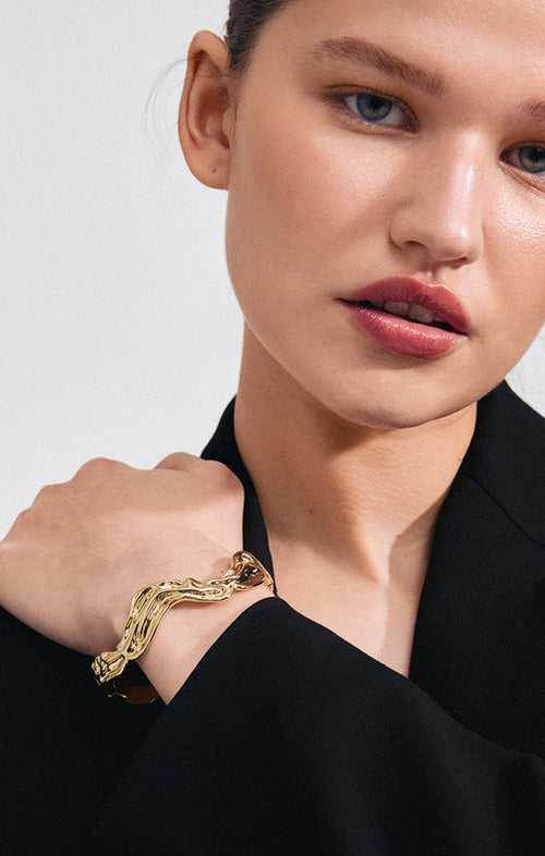 PILGRIM FEEL RECYCLED WAVY BANGLE BRACELET IN GOLD