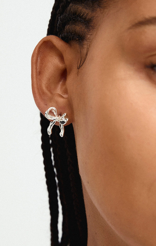 CASSIAN RECYCLED BOW EARRINGS IN SILVER