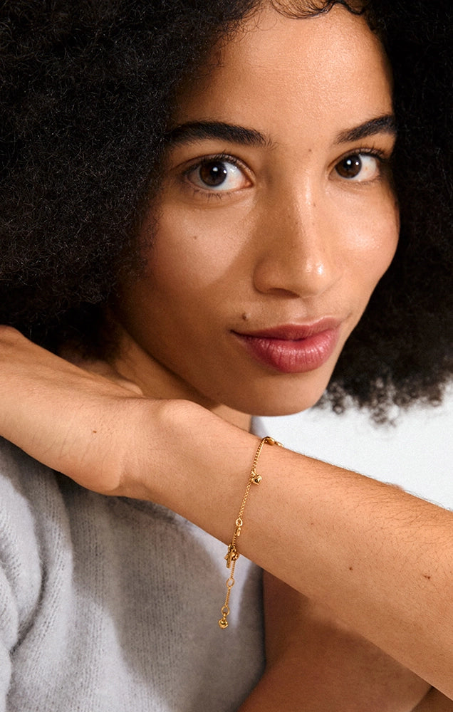 ALAIA RECYCLED HEART PENDANTS BRACELET IN GOLD