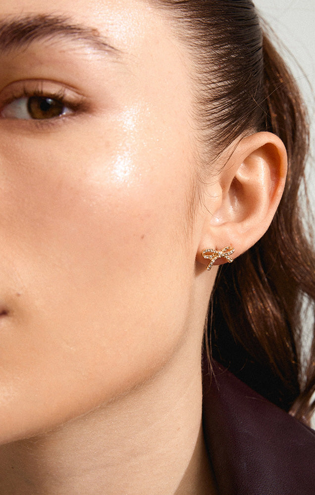 PILGRIM CATHARINA RECYCLED MICRO CRYSTAL BOW EARRINGS IN GOLD