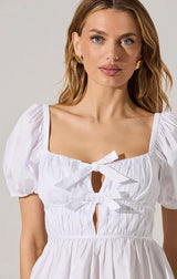 DARLENE BOW FRONT PEPLUM TOP