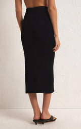 AVEEN CRINKLE STRETCH KNIT MIDI SKIRT IN BLACK